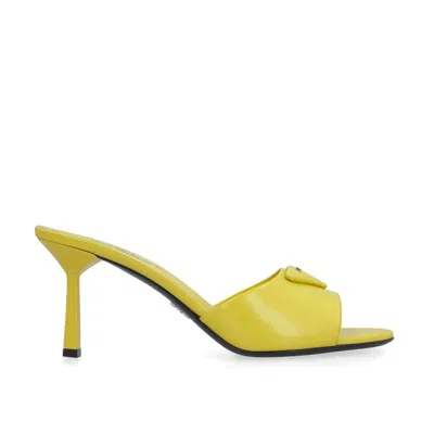 Shop Prada Leather Logo Mules In Yellow