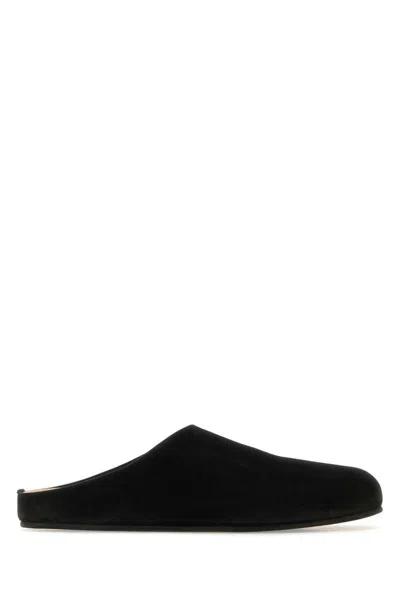Shop The Row Slippers In Black
