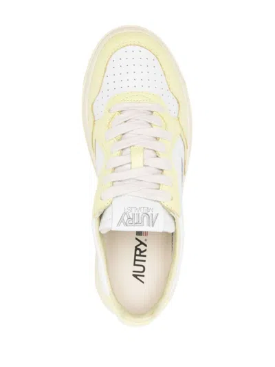 Shop Autry Medialist Low Leather Sneakers In Yellow