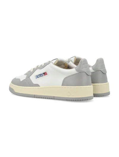 Shop Autry Medalist Low Top Sneakers In White Grey