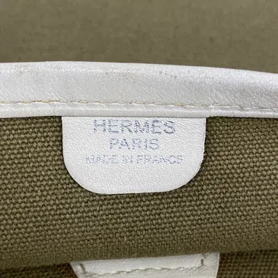 Shop Hermes Hermès Evelyn Khaki Canvas Shoulder Bag ()