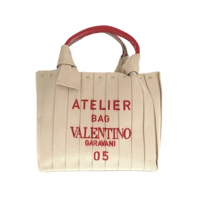 Shop Valentino Garavani Atelier Bag 05 Beige Canvas Tote Bag ()