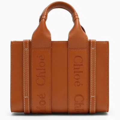 Shop Chloé Woody Mini Brown Bag In Orange