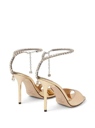 Shop Jimmy Choo Gold-tone Saeda Sandals With Crystal Embellishment In Calf Leather Woman In Grey
