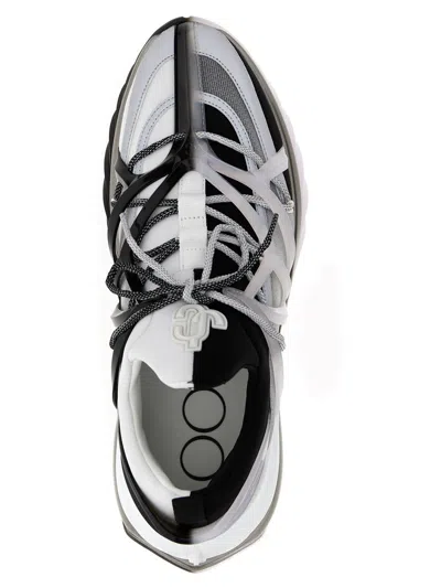 Shop Jimmy Choo Cosmos Sneakers In White/black