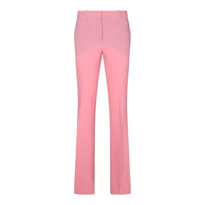 Shop Versace Trousers Pink