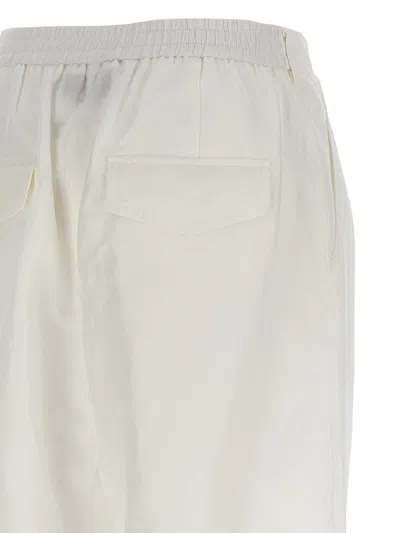 Shop Msgm Carrot Pants In White