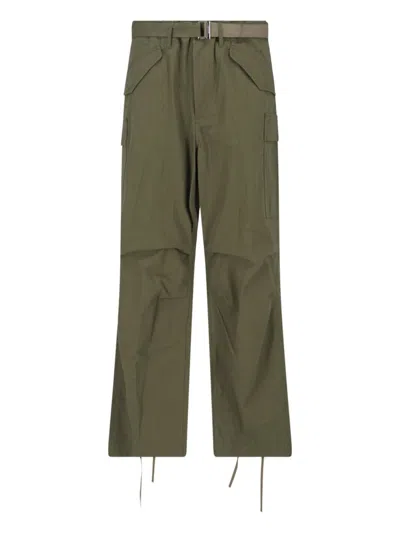 Shop Sacai Trousers In Green