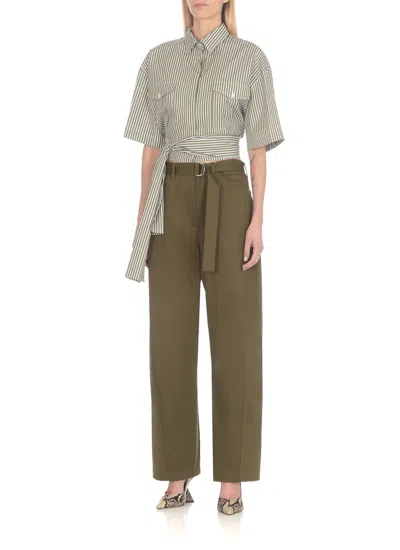 Shop Msgm Cotton Pants In Green