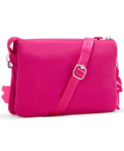 Shop Kipling Riri Barbie Crossbody Bag In Power Pink