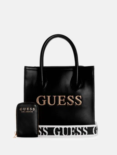 Shop Guess Factory Caracara Small Carryall In Black