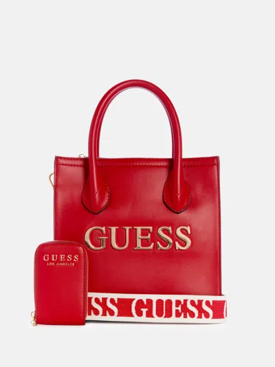 Shop Guess Factory Caracara Small Carryall In Red