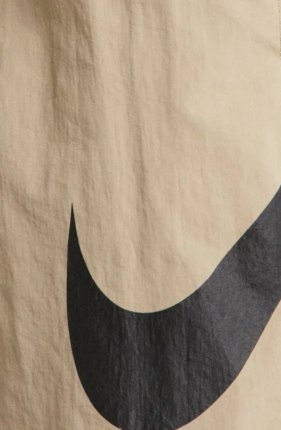 Shop Nike Swoosh 7-inch Swim Trunks In Khaki