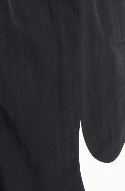 Shop Nike Swoosh 7-inch Swim Trunks In Black