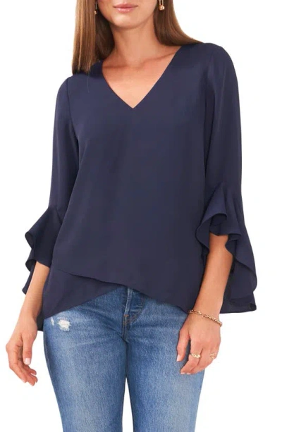 Shop Vince Camuto Flutter Sleeve Tunic In Classic Navy