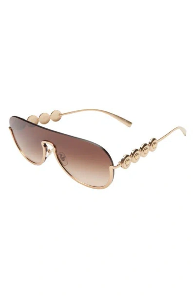 Shop Versace 138mm Pilot Shield Sunglasses In Gold/ Brown Gradient