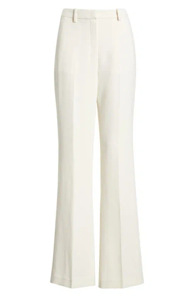Shop Theory Slim Fit Flare Trousers In Rice