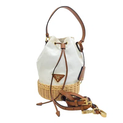 Shop Prada Bucket Bag White Canvas Handbag ()