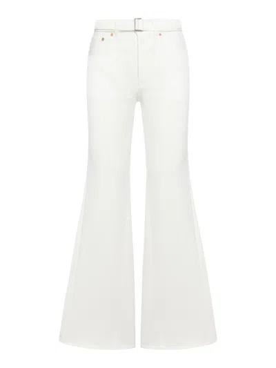 Shop Sacai Jeans In White