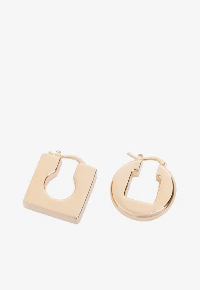 Shop Jacquemus Asymmetric Mini Hoop Earrings In Gold