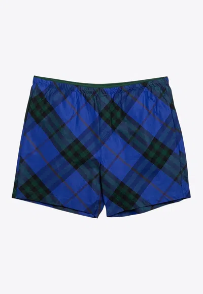 Shop Burberry Checked Swim Shorts In Blue