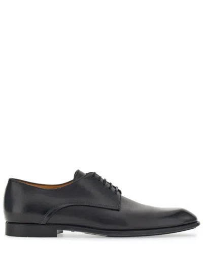 Shop Ferragamo Nuanced Derby Shoes In Black