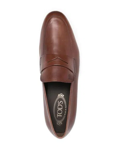 Shop Tod's Leather Loafer Shoes In Brown