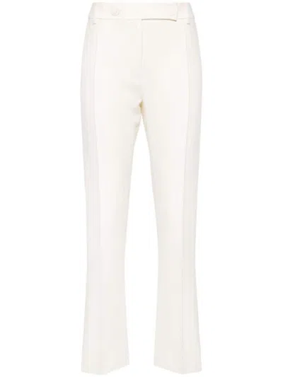 Shop Valentino Garavani Trousers In White