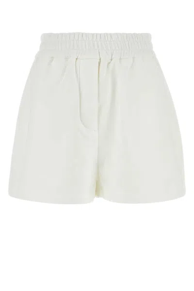 Shop Prada Shorts In White