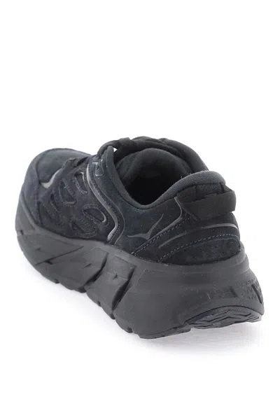 Shop Hoka Clifton L Sneakers In Black