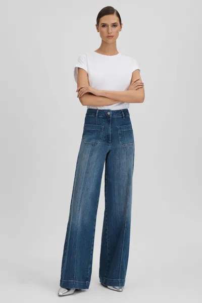 Shop Reiss Kira - Mid Blue Petite Front Pocket Wide Leg Jeans, 26