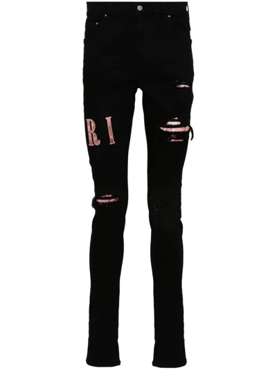 Shop Amiri Black Waxed Logo-appliqué Skinny Jeans
