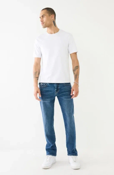 Shop True Religion Brand Jeans Geno Big T Slim Leg Jeans In Medium Lagoon Wash