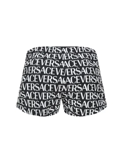 Shop Versace Swimwear In Nero/bianco