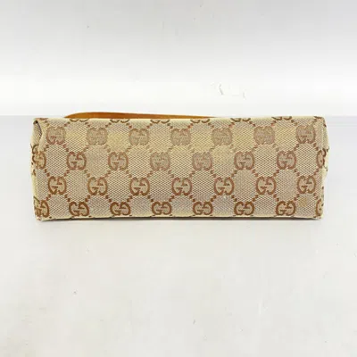 Shop Gucci Beige Canvas Clutch Bag ()