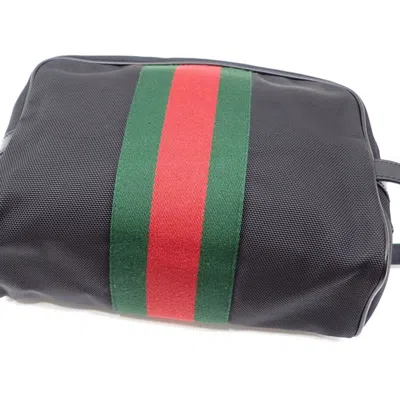 Shop Gucci Techno Black Canvas Clutch Bag ()