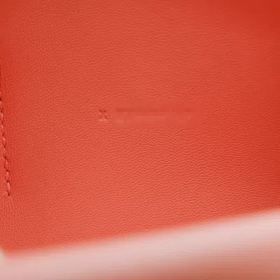 Shop Hermes Hermès Dogon Orange Leather Wallet  ()
