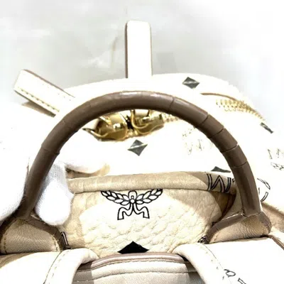 Shop Mcm Stark Gold Leather Backpack Bag ()