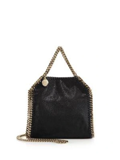 Shop Stella Mccartney Falabella Tiny Baby Bella Shimmer Faux-suede Tote In Black