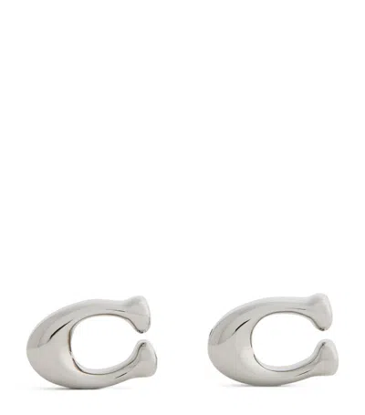 Shop Coach Signature Sculpted C Earrings In Silver