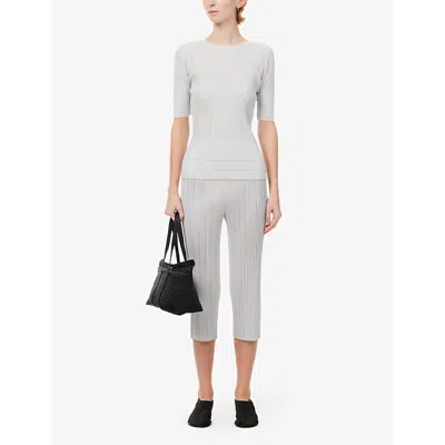 Shop Issey Miyake Pleated Straight-leg Mid-rise Knitted Trousers In Light Gray