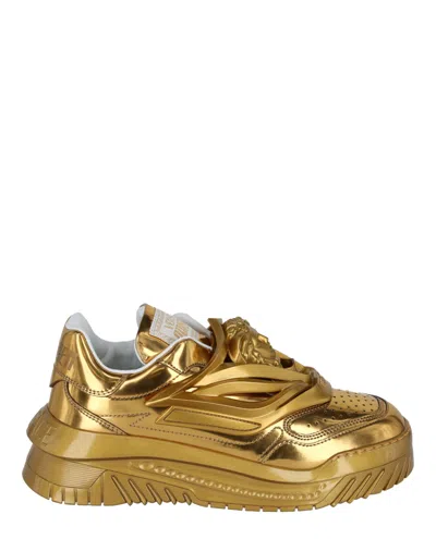 Shop Versace Odissea Sneakers In Gold