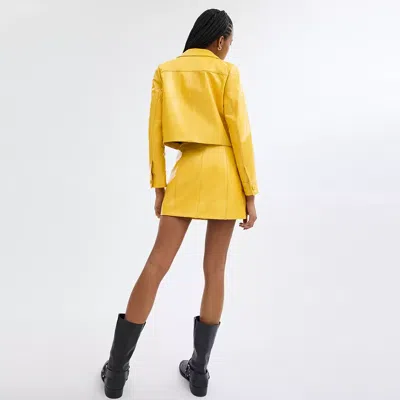 Shop Coach Heritage C Patent Leather Jacket In Yellow