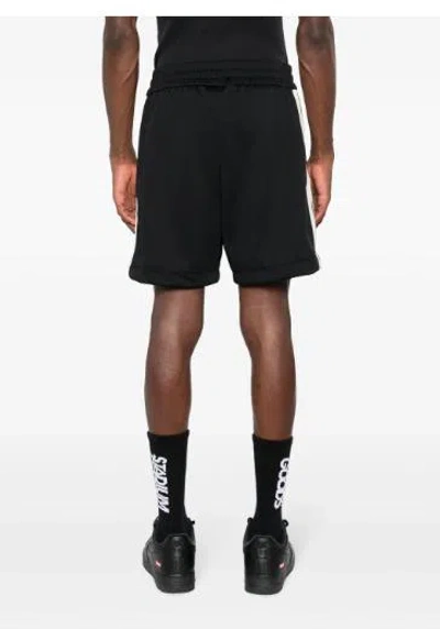 Shop Palm Angels Shorts In Black/butter
