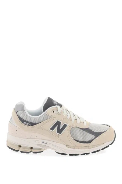 Shop New Balance 2002r Sneakers In Mixed Colours