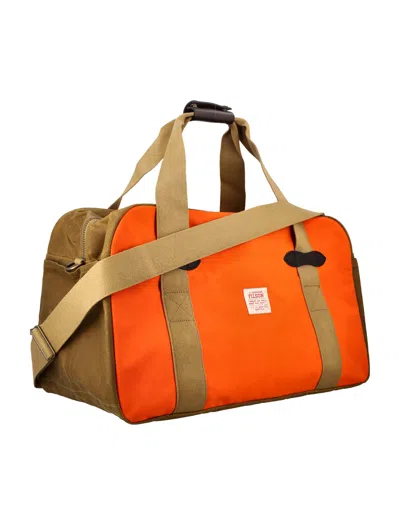 Shop Filson Tin Cloth Duffle Bag In Dk Tan Orange