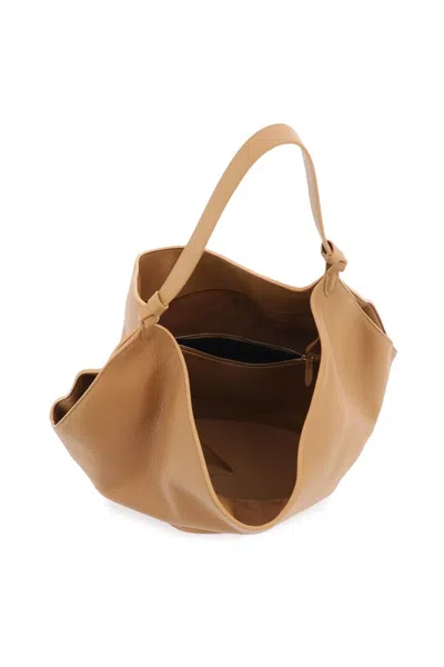 Shop Khaite Lotus Medium Bag In 棕色的