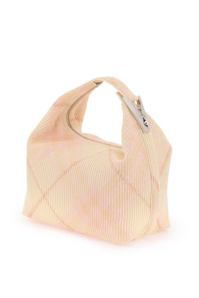 Shop Burberry Medium Peg Bag In 粉色的