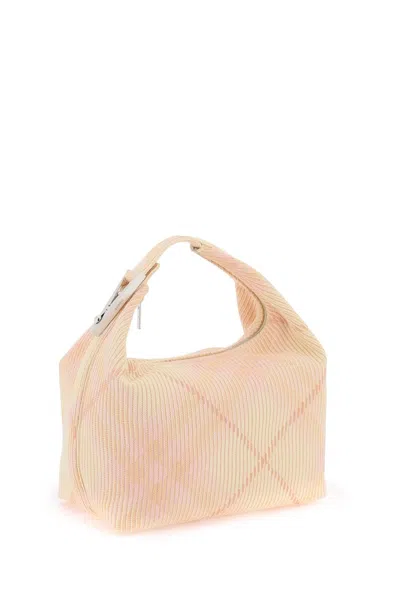 Shop Burberry Medium Peg Bag In 粉色的