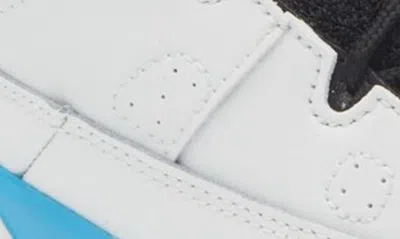Shop Jordan Kids' Air  9 Retro High Top Sneaker In White/ Black/ Powder Blue